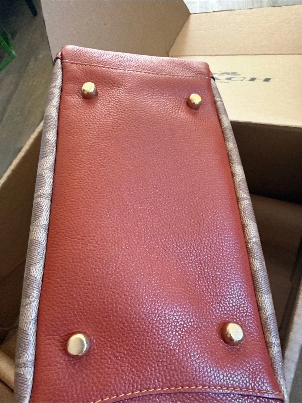 Coach Monogram Canvas Shoulder Bag in Orange.